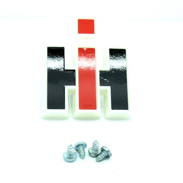 PLASTIC EMBLEM / BADGE FOR VARIOUS CASE INTERNATIONAL TRACTORS.